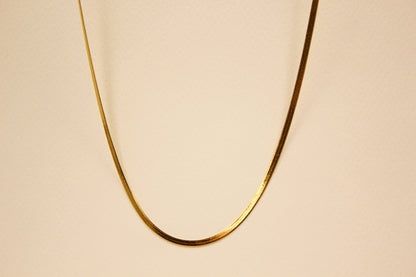 Snake Ribbon Necklace in Gold